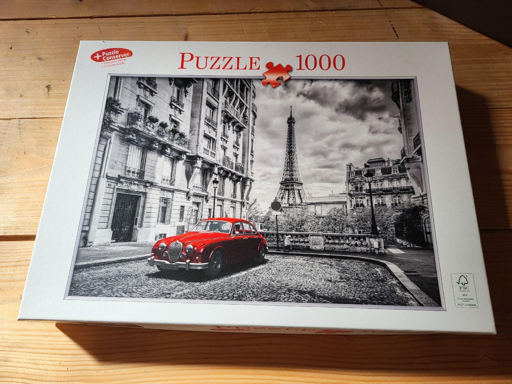 Puzzles: Puzzle Paris Eiffel Tower Auto 1000 Teile neuwertig – D'occasion à Heiden par Cherry16995