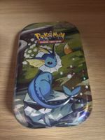 Pokemon Prismatic Evolutions: Vaporeon Mini Tin