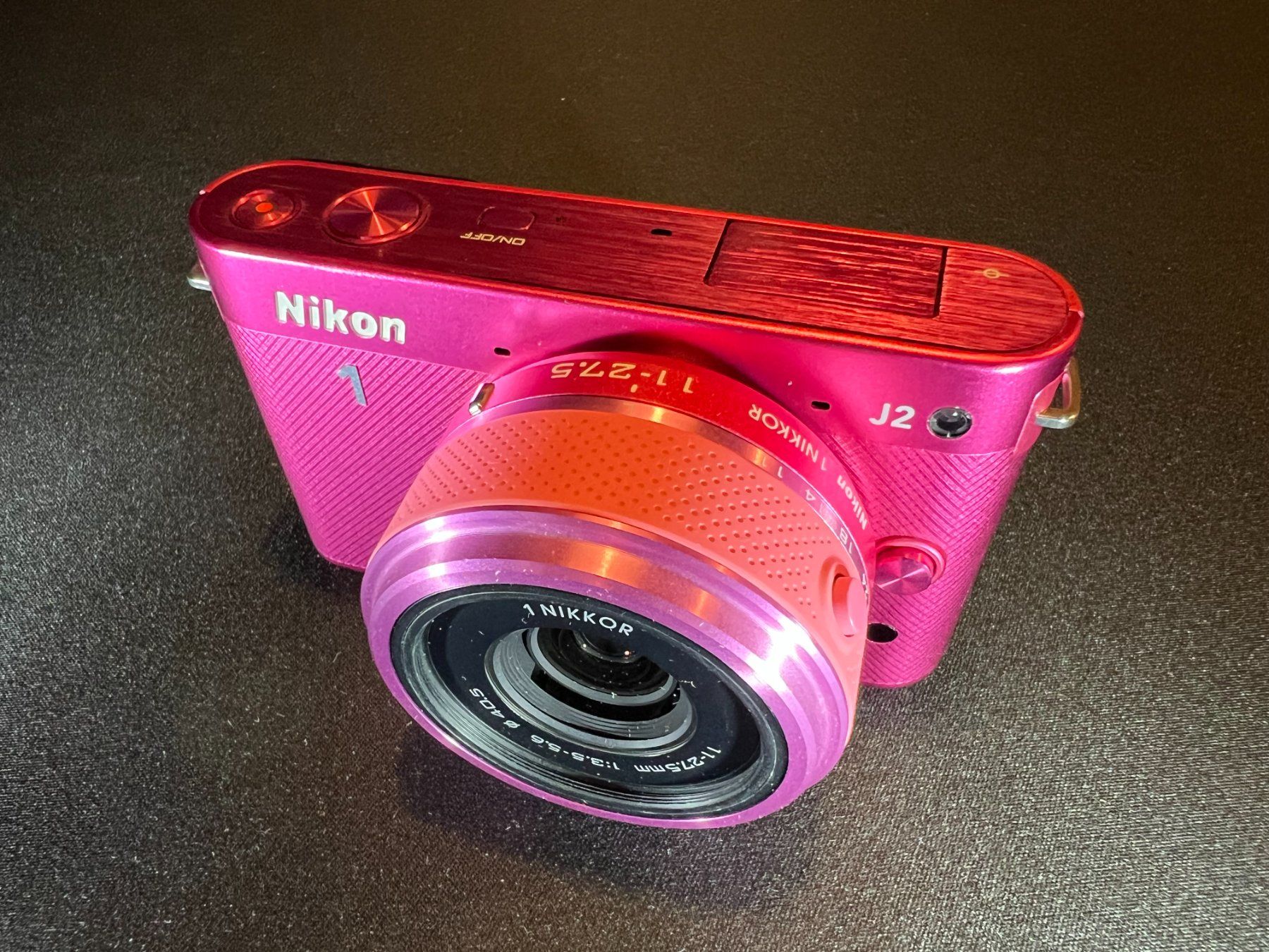 Nikon Fotocamera: Nikon 1 J2 mit Zoom Objektiv – Usato da Uster venduto da Stoessda