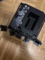 Platine de jeu Lego noire avec motif lune usagée