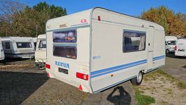 A vendre Adria Unica 502 DK avec lits superposés et auvent