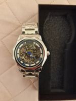 Montre automatique NEUVE, très élégante