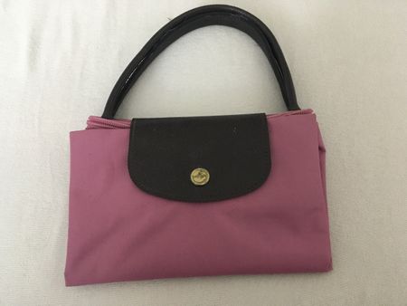 Rosa Handtasche faltbar