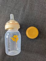 Medela Calma Muttermilchsauger mit Milchflasche 150ml