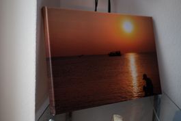 Lonely fisherman on a sunset in Vietnam