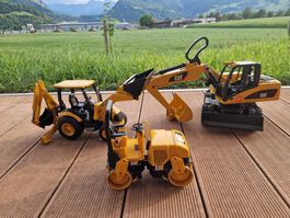 3 Baufahrzeuge: Bagger, Walze & Radlader CAT