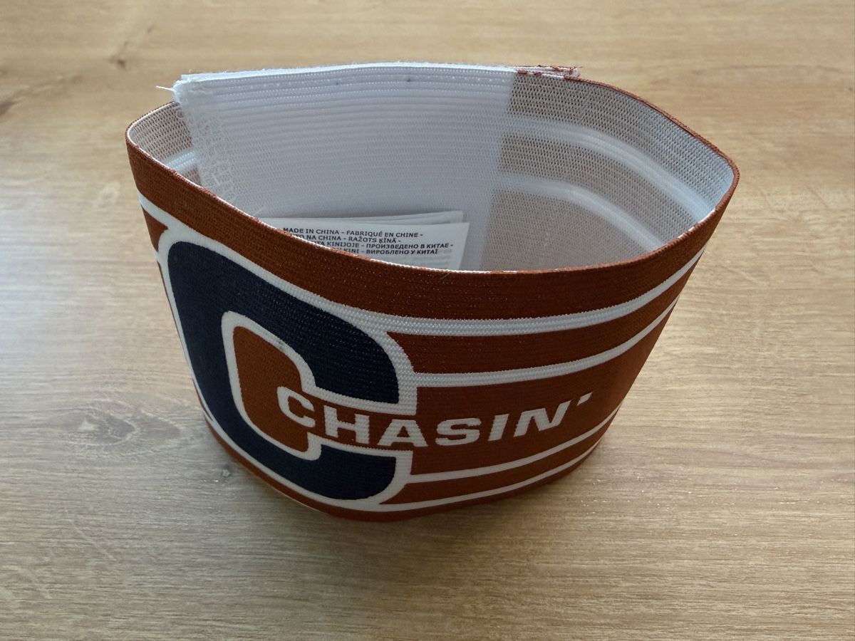Camicie: Captain-Binde orange Chasin – Nuovo e nell'imballaggio originale da Luzern venduto da jeltic 1