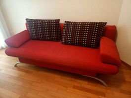 BettSofa rot mit zwei Zierkissen, gebraucht