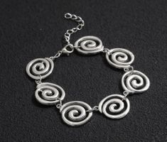 Bracciale donna spirale color argento regolabile nuovo