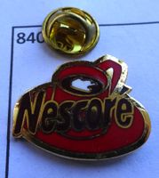 Pin NESCORE  Kaffee