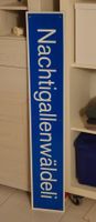Strassenschild aus Basel "Nachtigallenwäldeli"