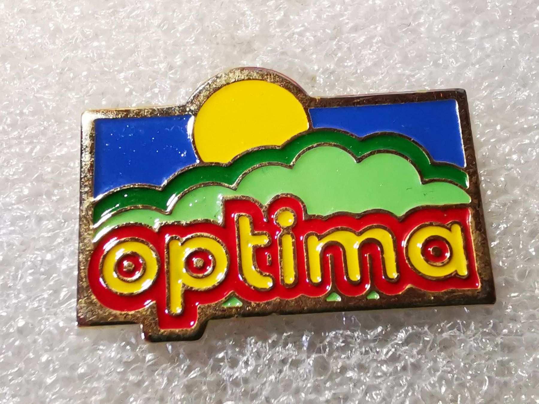 Placchette & Badge: Ansteckpin 143: Optima – Usato da Oppligen venduto da Pin-Fall-Shop