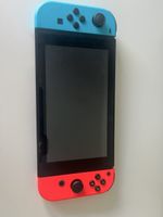 Nintendo Switch Konsole mit Spielen und Zubehoer