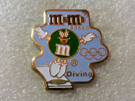 Ansteckpin 200: m&m's x Olympia