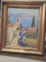 Tableau représentant un paysage de village au bord d'un lac