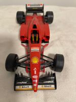 Auto Modellino Ferrari F310 Schumacher (Burago 1:24) !