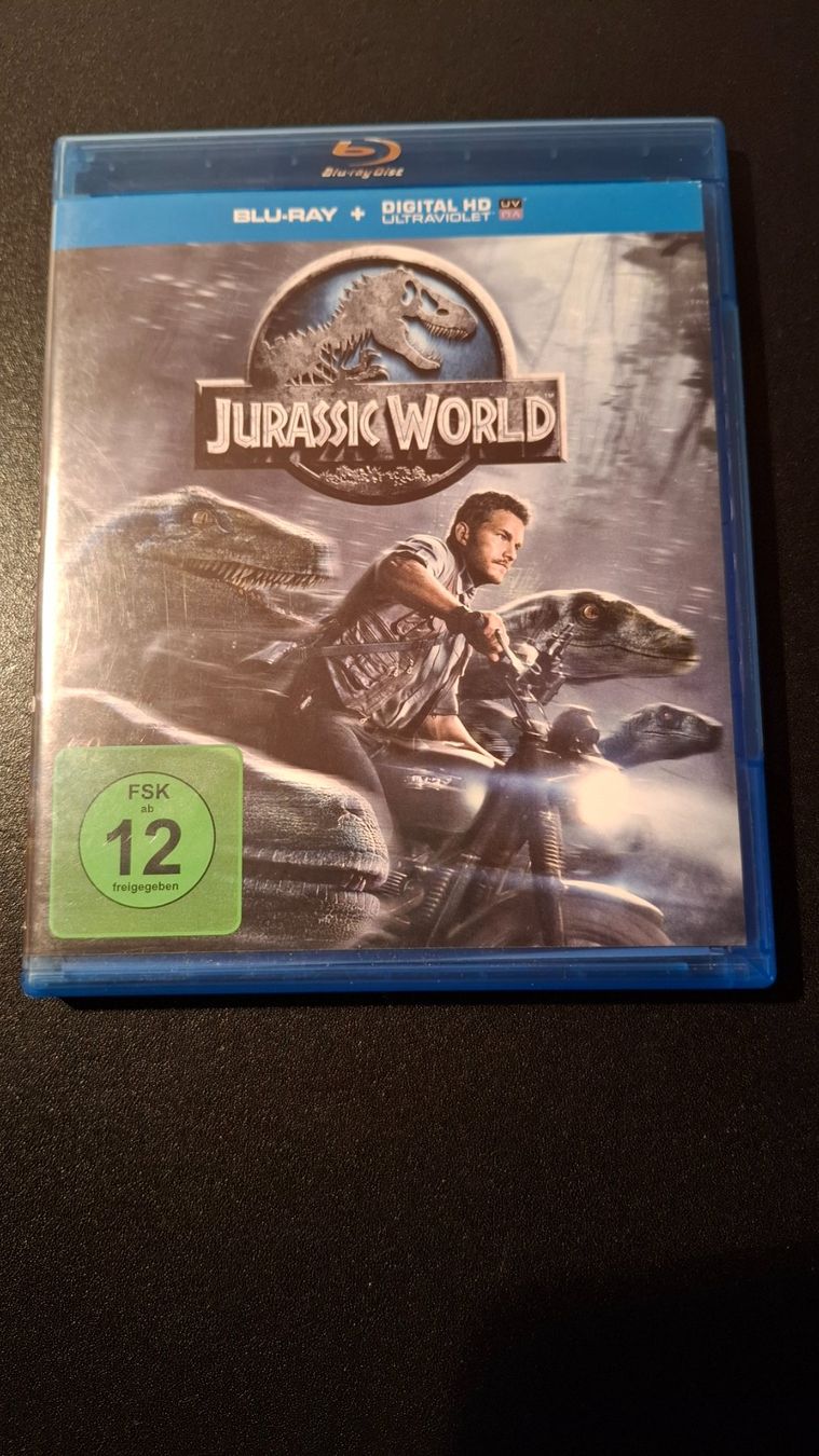 Tutti i DVDs: *Jurassic World* Blu-Ray-Disc / ab 12 J. – Usato da Brütten venduto da Sigimi