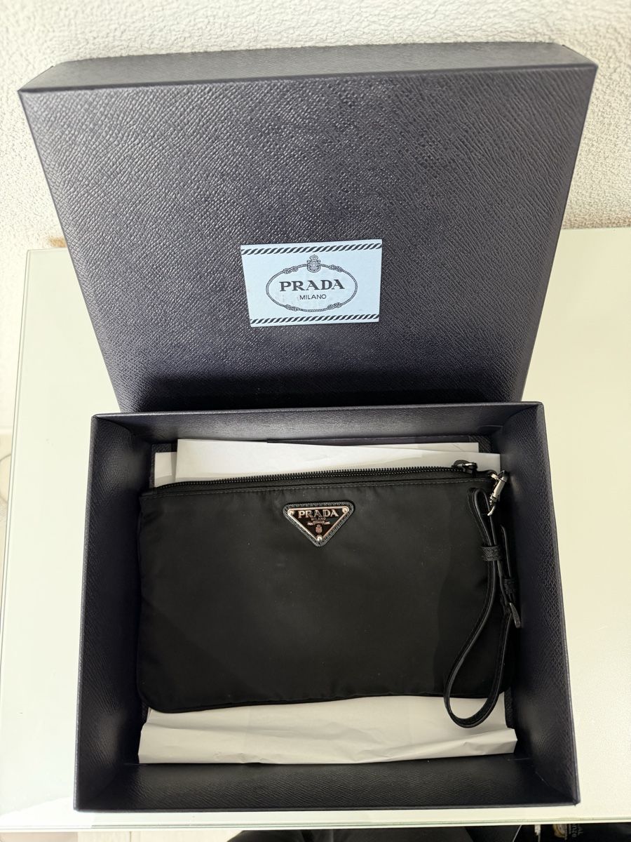 Prada Sacs: Zwei Prada Clutches – Neuf avec emballage d'origine à Dietikon par eli_cy5t 1
