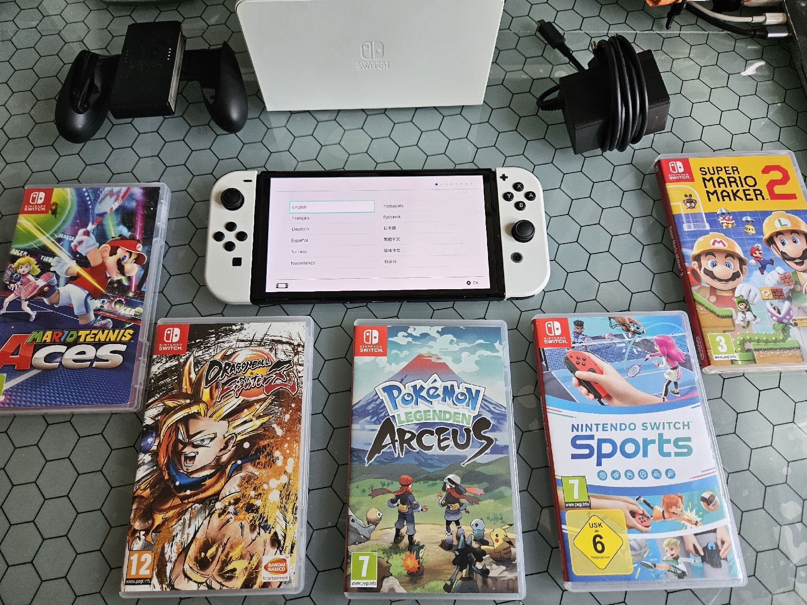 Nintendo Console: Nintendo Switch Oled avec 5 jeux  – Usato da Genève venduto da Pedro67