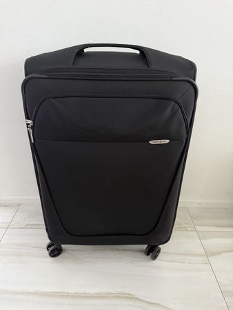 Schwarzer Samsonite Rollkoffer D-Lite