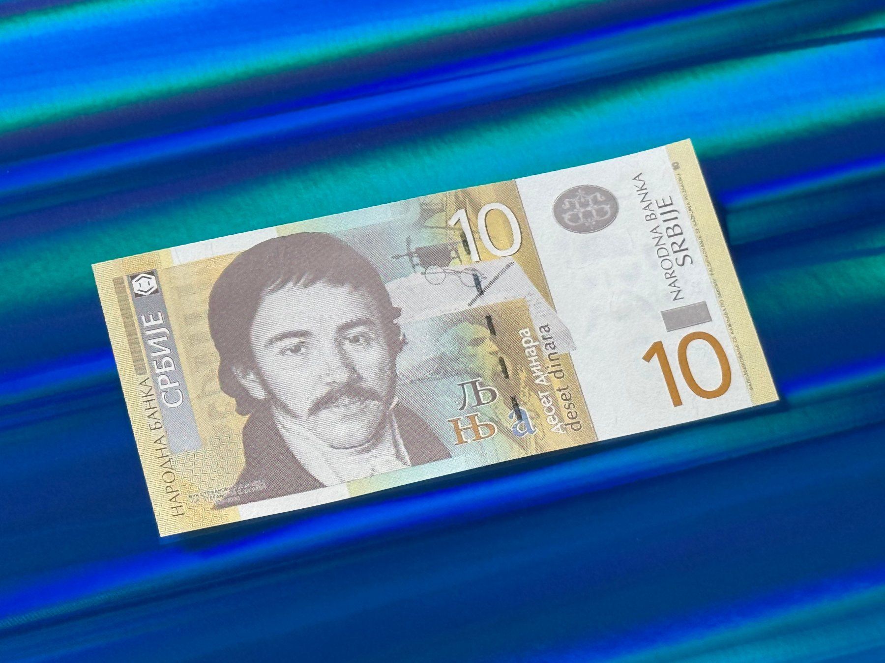 Banconote: Belgrad 2013 - Serbien - 10 Dinara UNC – Nuovo e nell'imballaggio originale da Pfäffikon SZ venduto da Sieben77 2