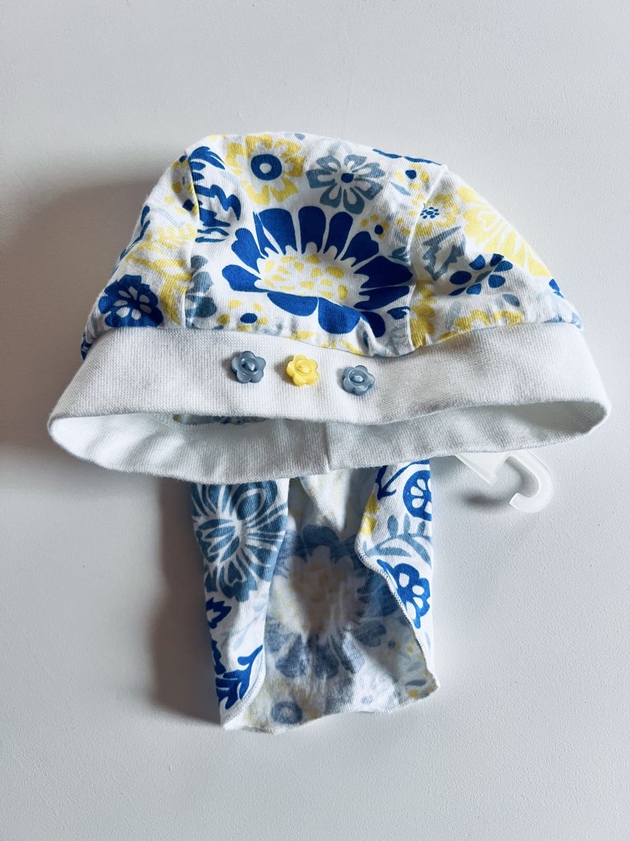 Altro abbigliamento per bambino: Blumenmütze Gr. 51, 80-86, neu – Nuovo e nell'imballaggio originale da Teufen AR venduto da Maleaa 1