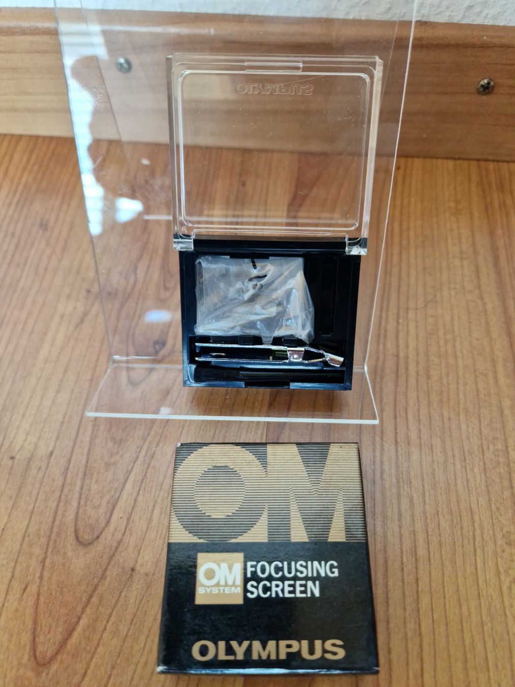 OM System Fotocamera: Olympus OM Einstellscheibe 1 - 1 - OVP, Neu – Nuovo e nell'imballaggio originale da Vevey venduto da dreetje9
