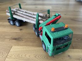 Bruder Spielzeug LKW MAN Holztransporter grün gebraucht
