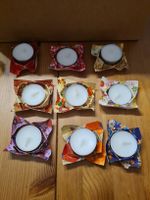Teelichter mit Origami-Halterungen 9 Stück neu