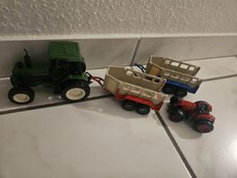 2 Traktoren und 2 anhänger