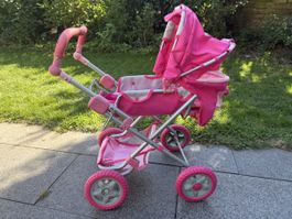 Puppenwagen pink mit verstellbarem Griff