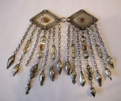RAUTENFÖRMIGE SCHNALLE  SILBER.TURKMENISTAN, YAMUD, A. 20.JH
