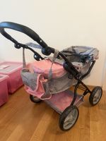 Puppenwagen grau rosa gebraucht mit Flecken im Stoff