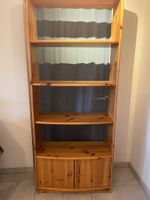Bibliothèque en bois massif avec portes, état d'occasion