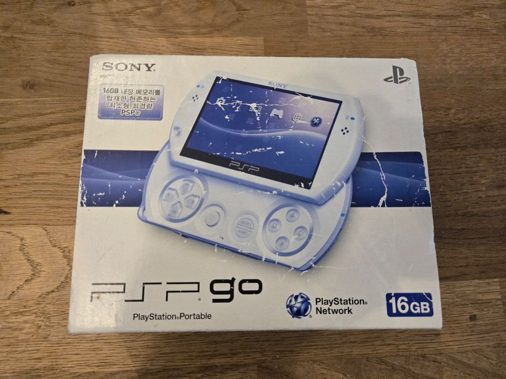 Console Sony PSP-1004 Blanche PAL - Avec Dragon, Bloc, Memory Stick 4Go - Occasion