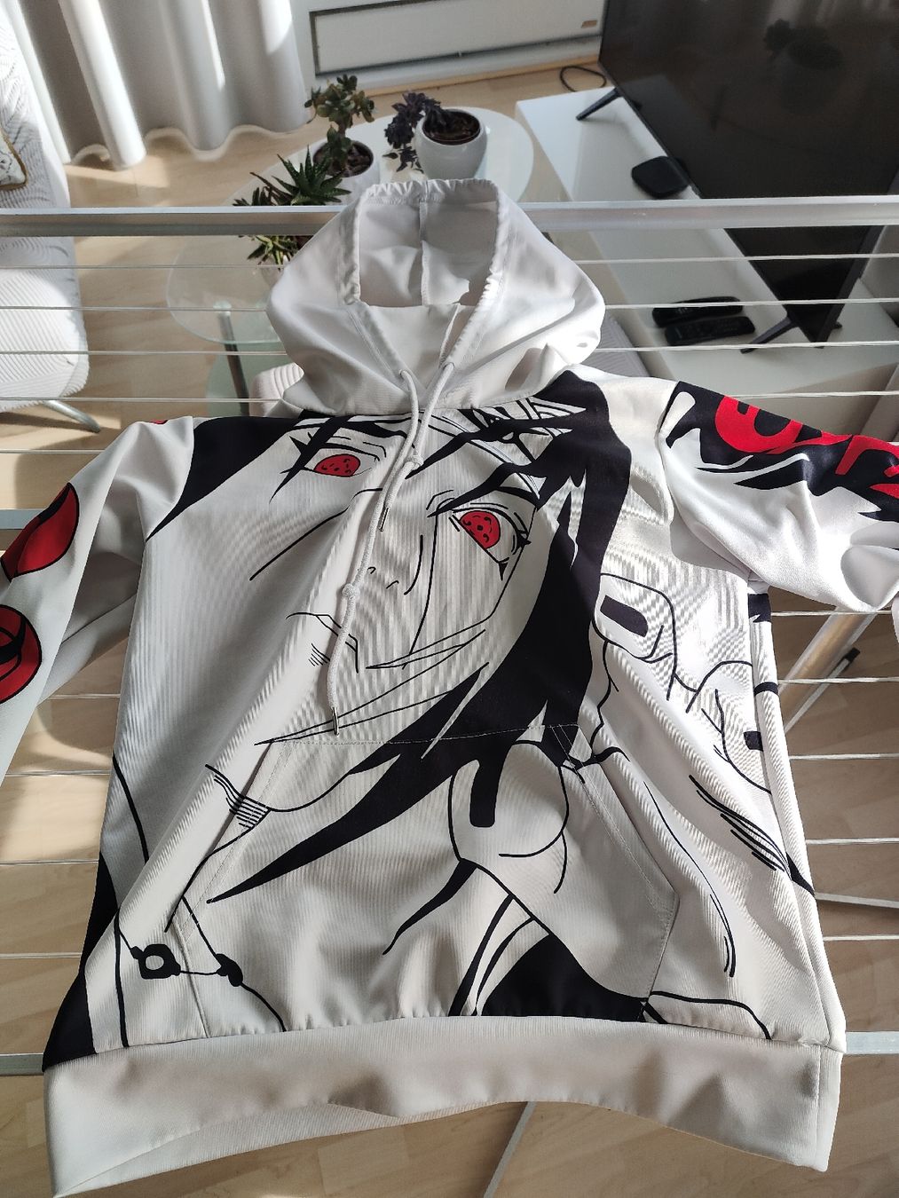 Kleiderpakete & -sets: Naruto-Kapuzenpulli Grösse S – Gebraucht aus Oetwil an der Limmat von MicA-8955