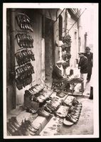 Fotografie Marseille, Schuhmacher mit We