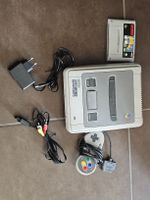 Console SNES Super Nintendo avec jeu Super Soccer et manette