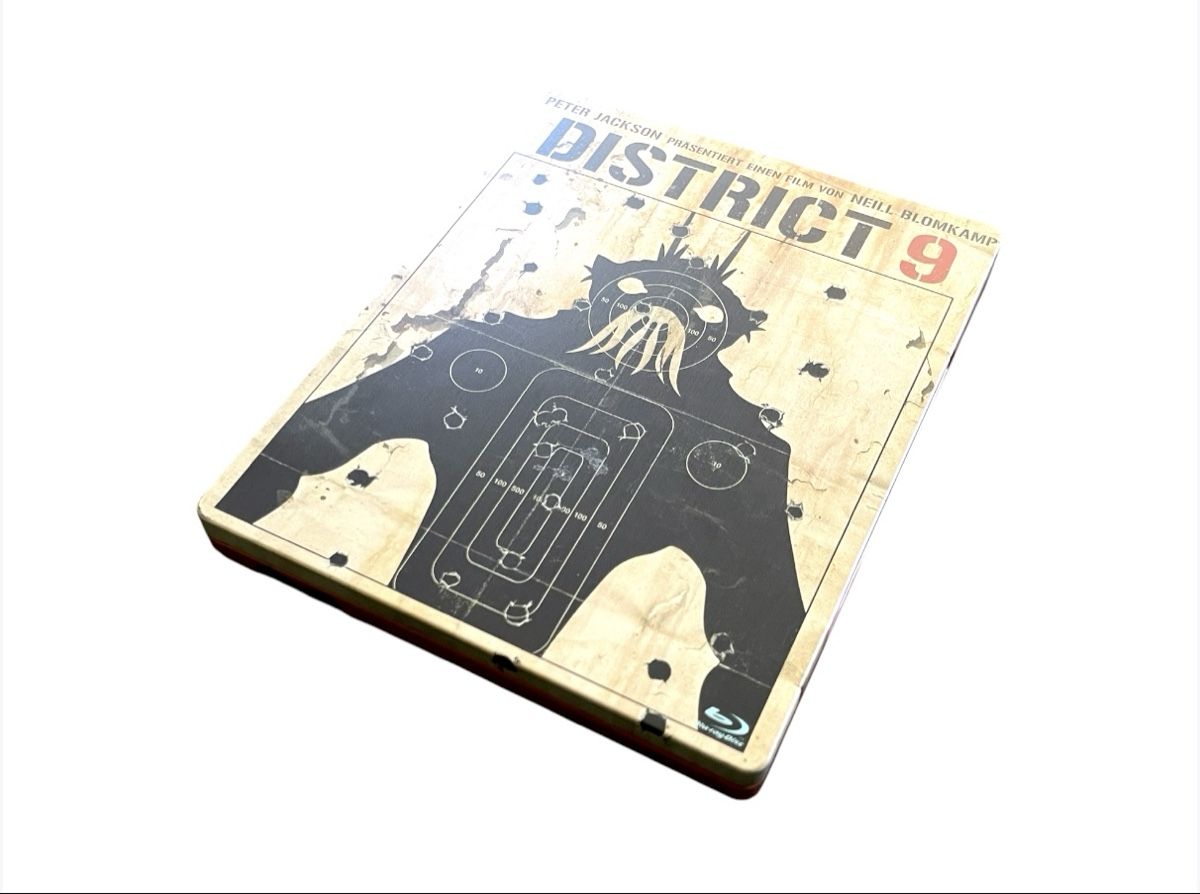 Tutti i DVDs: District 9 - Limited Steelbook Edition - BluRay – Usato da Luzern venduto da woti-shop 4