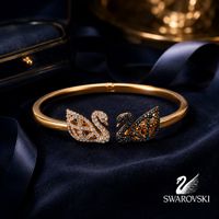 SWAROVSKI ARMREIF ARMBAND SCHWAN ROSEGOLD FUNKELTRAUM M