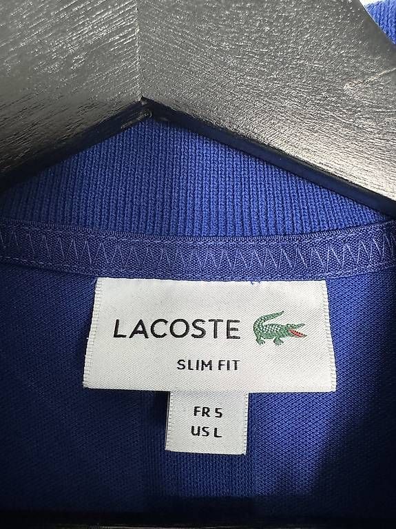 Magliette Polo: Lacoste Poloshirt (blau)  – Usato da Rothrist venduto da Baggio19 2
