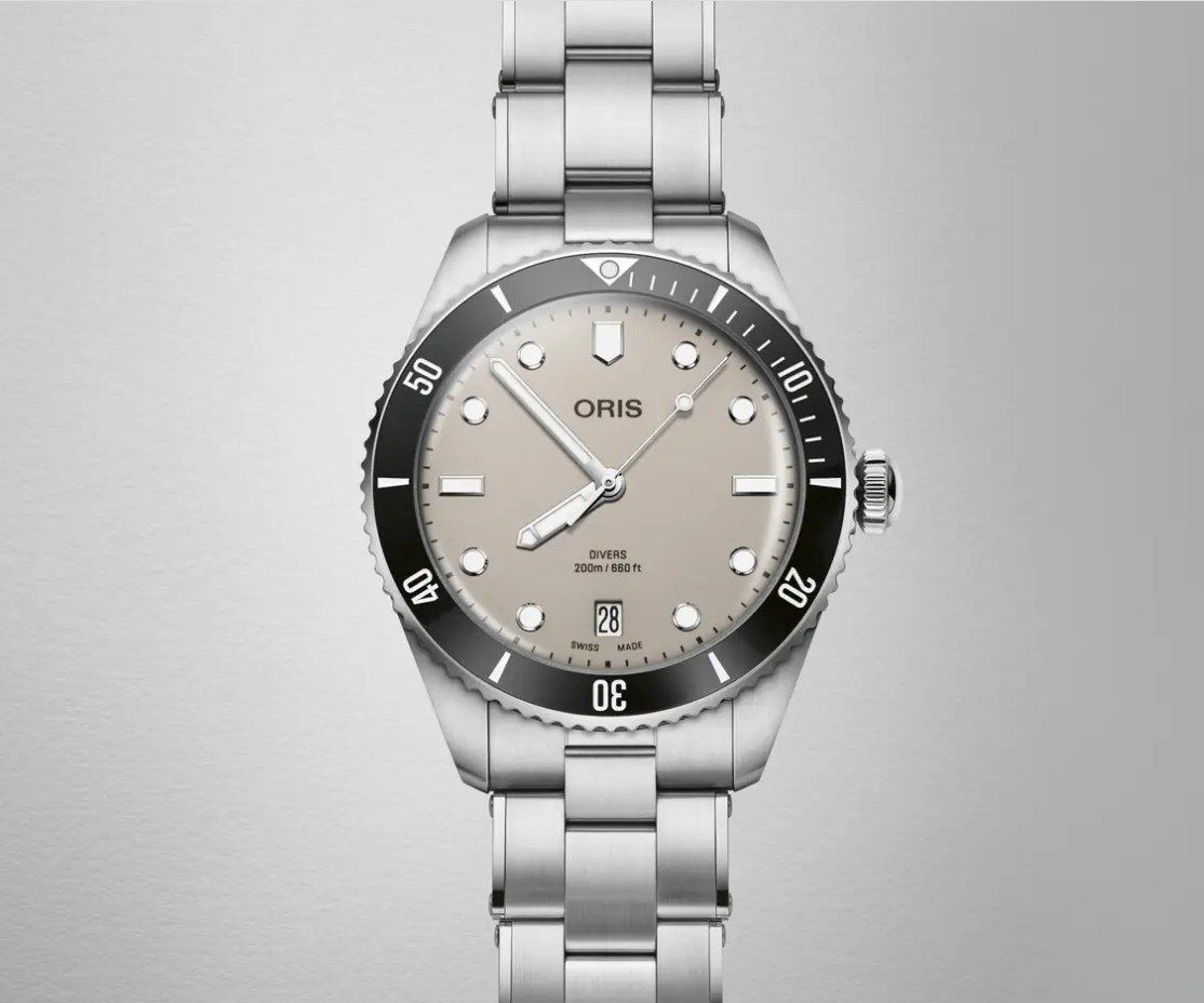 Oris Orologi: Divers Date – Nuovo e nell'imballaggio originale da Kilchberg ZH venduto da Schiveli 1