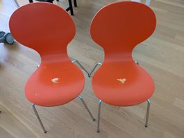 Stühlen orange