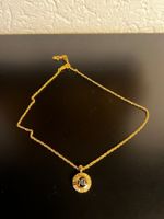 Nina Ricci Halskette goldfarben mit Kristallen