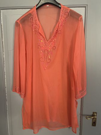 1 chemisier couleur rose taille L selon photos