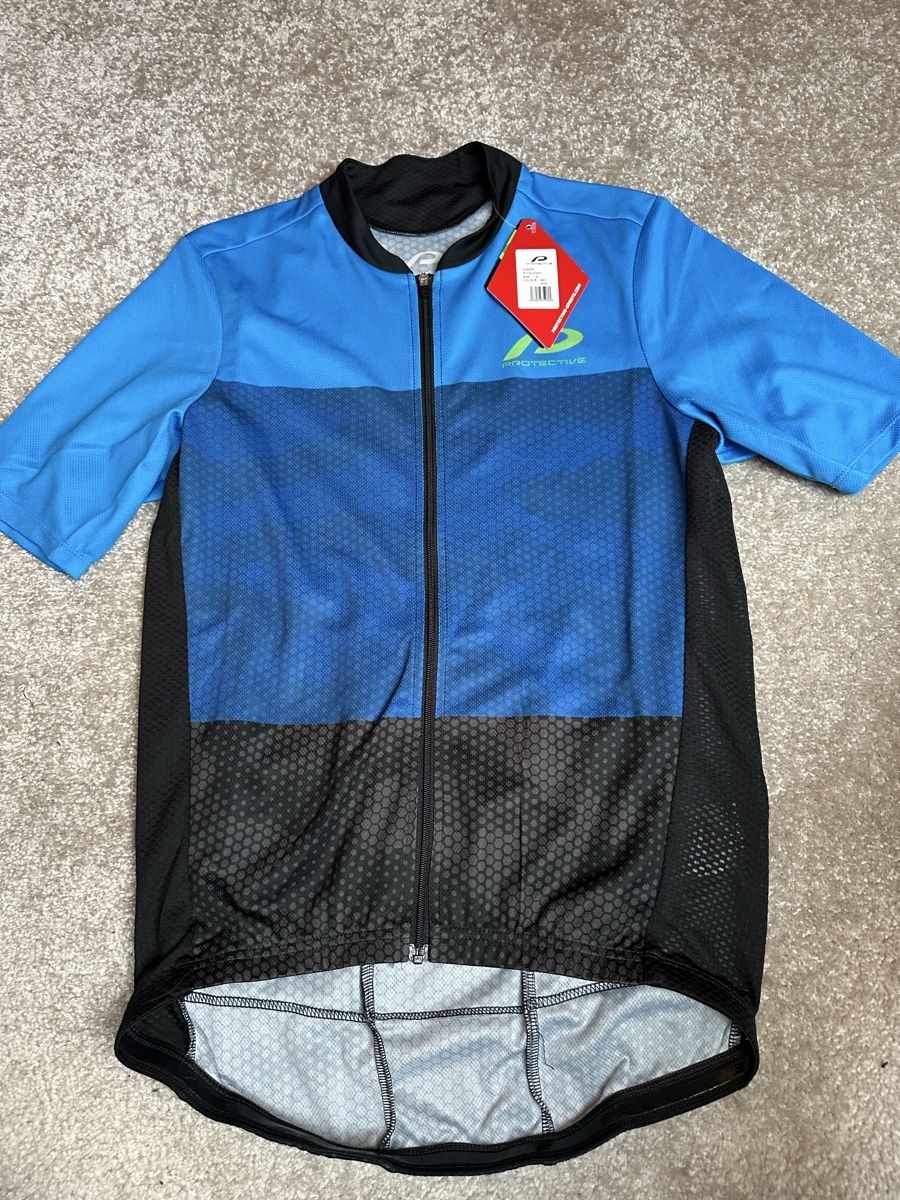 Canottiere & Pantaloni: Maillot de vélo Protective – Nuovo e nell'imballaggio originale da Savagnier venduto da Pivovar2