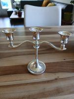Elegant Silver-Plated Candelabra, Holds 3 Candles.