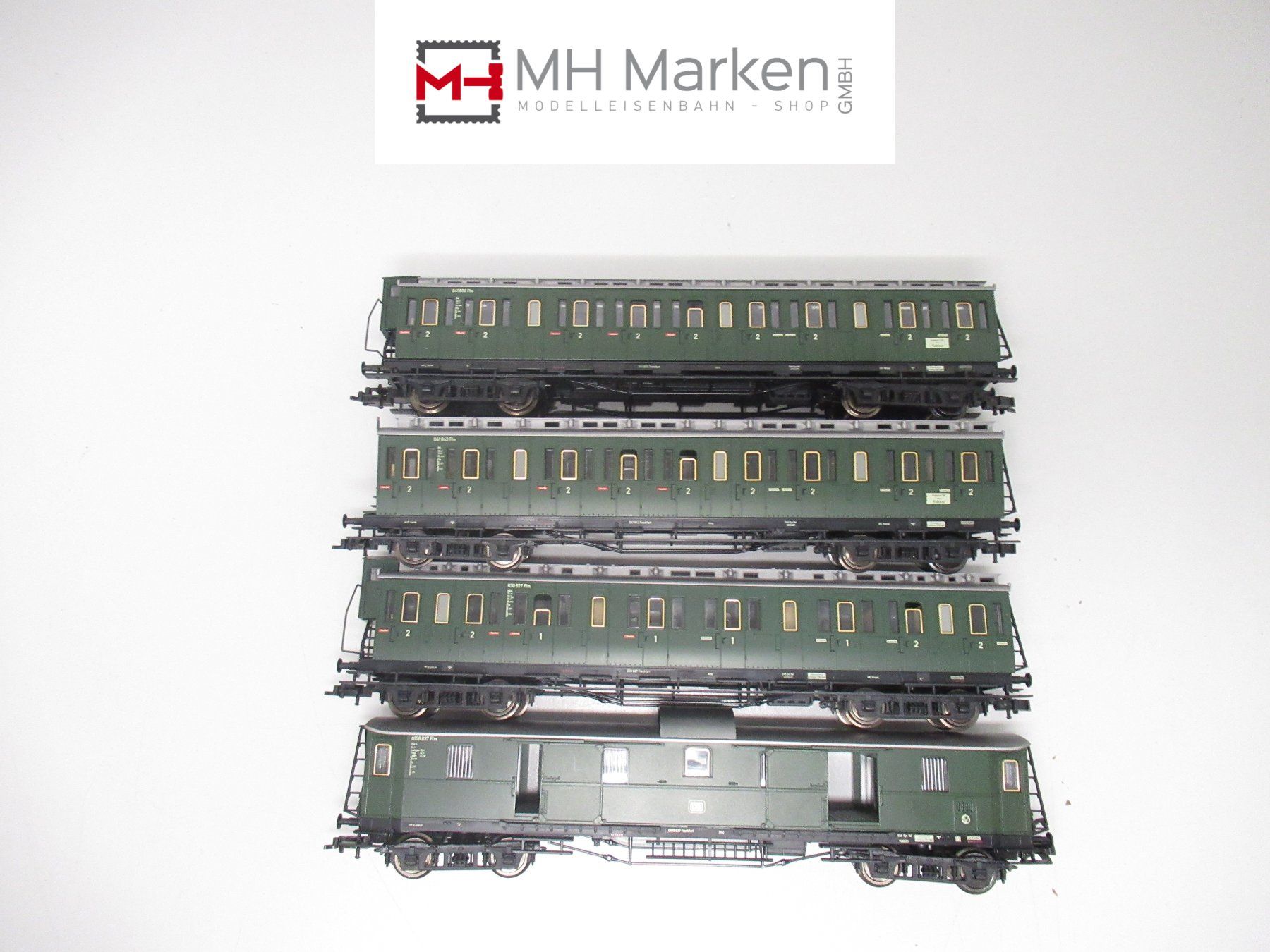 Fleischmann Modellini di ferrovie: Fleischmann 5684/86/89/90 4-teiliges Oldtimerwagenset DR DC – Usato da Basel venduto da mhmarken