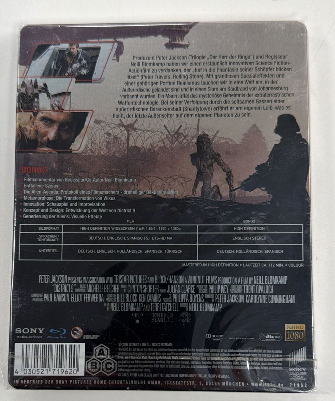 Tutti i DVDs: DISTRICT 9 STEELBOOK BLU -RAY – Nuovo e nell'imballaggio originale da Zürich venduto da freioccasionen 1