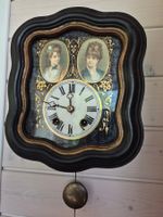 Schöne alte Wanduhr